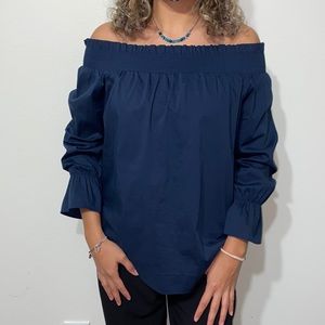 Off the shoulder, navy blue blouse. Medium